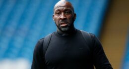 Darren Moore reacts to Sheffield Wednesday going top after Lincoln City draw