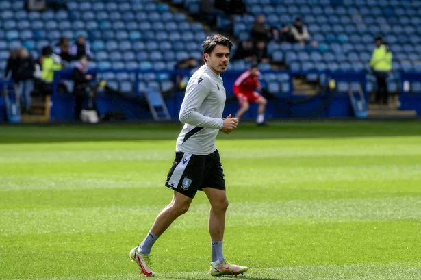 Darren Moore's cryptic update leaves question mark over Sheffield Wednesday defender's future