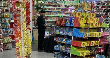 House of Candy in Oxford Street where half of the store is American sweets and the other has vapes up for sale in neon light displays