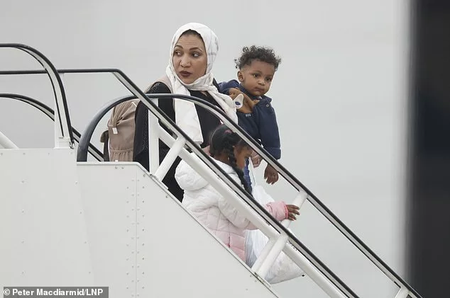 Escape from Hell: First Brits evacuated from Sudan land in the UK