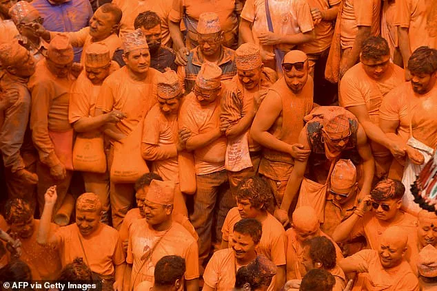 Festival-goers welcome spring and the New Year in spectacular Nepal ceremony