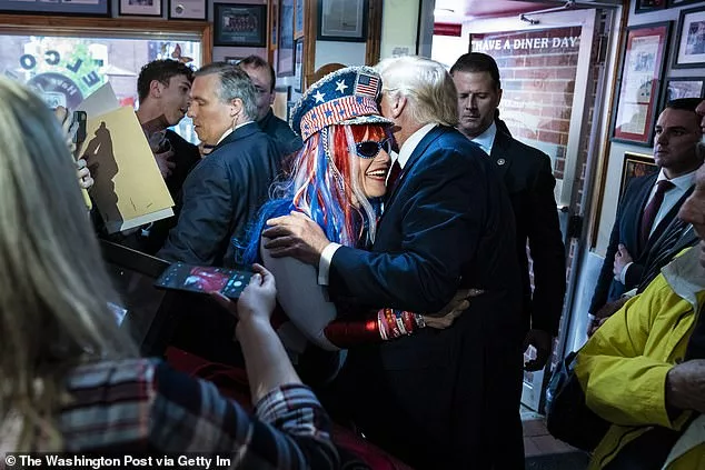 January 6 convict hugs Trump at a New Hampshire diner and then calls for Mike Pence to be executed 