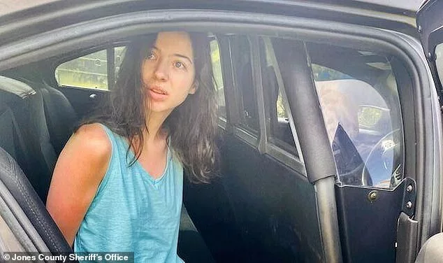 Moment Mississippi woman, 19, is arrested over video showing her ‘having intercourse with a DOG’ 