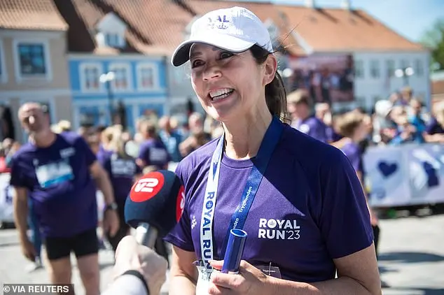 Racing Queen! Princess Mary storms ahead of contestants during one-mile Royal Run in Nyborg