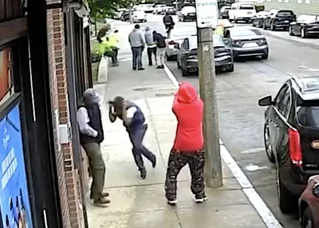 Terrifying moment gunman opens fire in broad daylight on Boston street