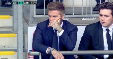 Poor start: David Beckham and son Brooklyn cut very glum figures after Manchester City scored within the first 12 seconds during the Emirates FA Cup final against Man Utd on Saturday