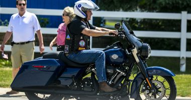 DeSantis signs Bible, Pence hops on motorcycle