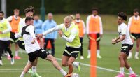 Erling Haaland (middle) showed his strength in Manchester City's version of the 'Murderball' training drill