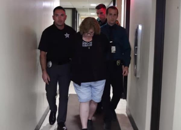 A judge granted a $154,000 bond Friday for a Florida woman charged with fatally shooting a Black neighbor through her front door.