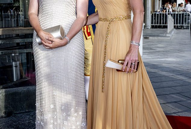 Pictured: Queen Máxima of the Netherlands (right) on the red carpet with Queen Mathilde of Belgium this evening