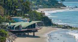 The iconic home was designed by late architect Harry Gesner, who died in 2022, after he and original homeowner Gerry Cooper 'discovered a hidden cove with good waves for surfing several miles up the coast, away from the Malibu Colony'