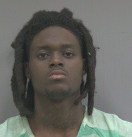 Man on pre-trial release arrested for possession of a firearm by a convicted felon after allegedly running from officer
