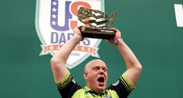 Michael van Gerwen celebrates after defeating Jeff Smith at the US Dart Masters in New York
