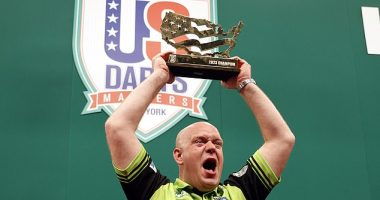 Michael van Gerwen celebrates after defeating Jeff Smith at the US Dart Masters in New York