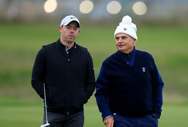 Jimmy Dunne (right) pictured alongside one PGA loyalist, Rory McIlroy, back in September