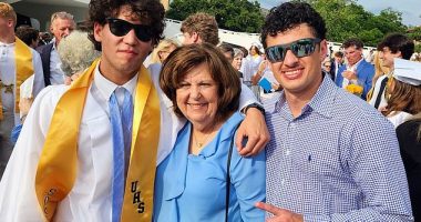 Robbins, pictured (left) with his grandmother and brother, had only just graduated from high school days before the tragedy