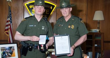 Sergeant Cory Maynard  (pictured left) died Friday, as state police investigated a shooting call in the town of Beech Creek