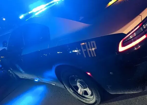 HILLSBOROUGH COUNTY, Fla. - Two people are dead, and another seriously injured after a driver ran a red light Sunday night in Lutz.