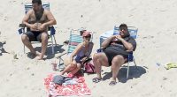 For many people in New Jersey, this 2017 photograph summed up Chris Christie's time in office. He and his family were seen on a deserted beach during a holiday weekend, while state parks were closed because of a state government shutdown
