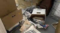 This image, contained in the indictment against former President Donald Trump, shows boxes of records in a storage room at Trump's Mar-a-Lago estate in Palm Beach, Fla., that had fallen over with contents spilling onto the floor