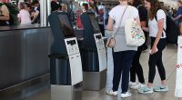 The infuriating problem of lost luggage when flying is caused by several factors, and some of it is the passengers' own fault, an airport insider has revealed. Passengers are shown using self check-in machines at Sydney Airport