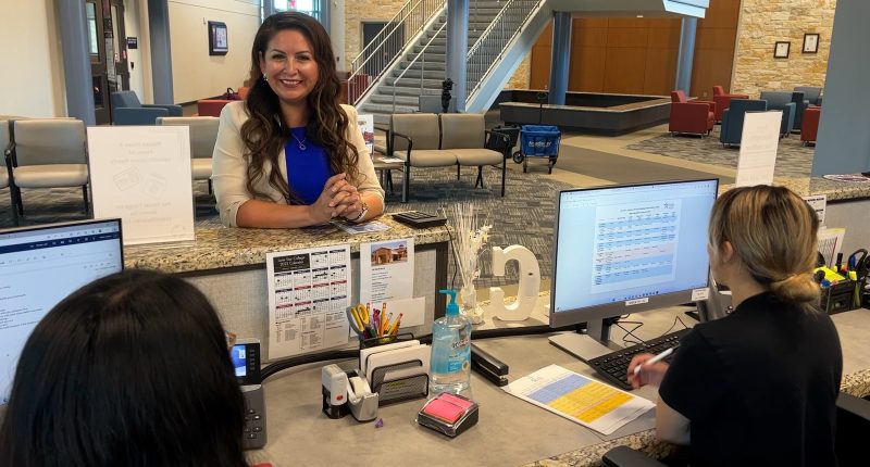 Former custodian credits education for her rise to college dean