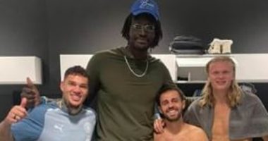 7ft 6 basketball star Mamadou N'Diaye DWARFS Erling Haaland in a snap shared from behind the scenes after Man City's 3-1 victory against West Ham - not to mention 5ft 8 Bernardo Silva!