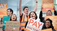 It comes as rising numbers of doctors are quitting due to worsening working conditions and poor pay. Many are also retiring in their 50s, moving abroad or leaving to work in the private sector because of soaring demand. Pictured, junior doctors and consultants on the picket line outside University College Hospital in London yesterday