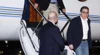 Siamak Namazi (far right), Morad Tahbaz (middle) and Emad Shargi (left) arrive at Davison Army Airfield, Tuesday, September 19