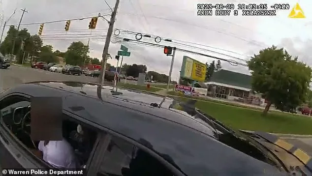 In the video, Officer Fraser immediately makes his way towards the car and can be seen reaching inside to assist the family