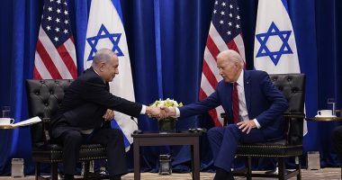 President Joe Biden shook hands with Israeli Prime Minister Benjamin Netanyahu in New York Wednesday, as hundreds of demonstators gathered outside protesting Netanyahu's government's proposed judicial overhaul