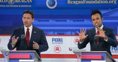 Candidates in the second GOP debate attack each other and Trump — even though he's absent