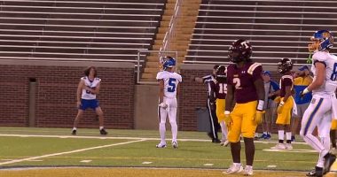 A high school football game was briefly paused after gunshots were heard outside the stadium