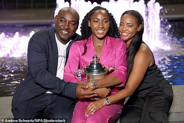 Coco Gauff beams as she sits alongside her mother and father outside Arthur Ashe Stadium