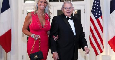 Senator Bob Menendez (D-NJ) and his wife Nadine Arslanian arrive for a state dinner in honor of French President Emmanuel Macron at the White House in December 2022; the couple has been charged on three criminal counts related to bribery and extortion