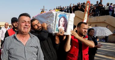 From wedding joy to a mass funeral: Devastated families bury their loved-ones just hours after inferno sparked by fireworks ripped through Iraqi wedding killing at least 110