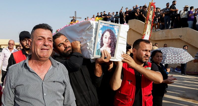 From wedding joy to a mass funeral: Devastated families bury their loved-ones just hours after inferno sparked by fireworks ripped through Iraqi wedding killing at least 110