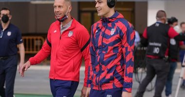 Reports say  USMNT coach Gregg Berhalter (L) and player Gio Reyna (R) have re-connected