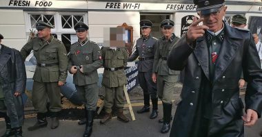 Group at centre of Nazi uniform row at 1940s festival insist they were NOT dressed as Germans but instead foreign troops who joined the SS to fight Stalin's Red Army