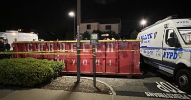 A severed human leg was found sticking out of a red recycling bin in a TD Bank parking lot in Queens on Wednesday night
