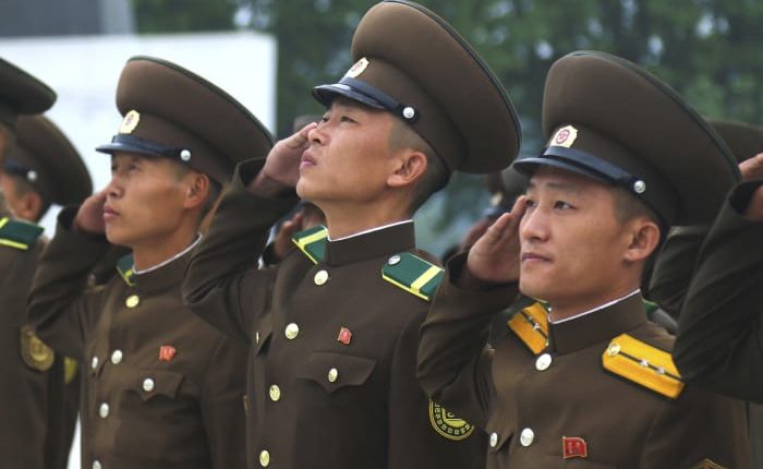 Kim Jong Un hosts Chinese and Russian guests at a parade celebrating North Korea's 75th anniversary