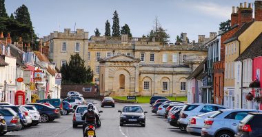 Locals in historic market town hire their own private security company to patrol streets at night with dogs and marked cars after spate of burglaries