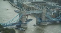 London's Tower Bridge is stuck open after letting a boat through - causing major road jams in both directions