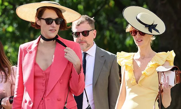 Lost the memo not to upstage the bride, Phoebe? Downton Abbey star Michelle Dockery marries Phoebe Waller-Bridge's brother in star-studded ceremony as the Fleabag creator watches on, beaming with happiness
