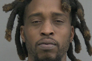 Man on pre-trial release arrested on gun and drug charges