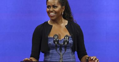 Former first lady Michelle Obama speaks at the opening ceremony of the of the U.S. Open tennis championships, Monday, Aug. 28, 2023