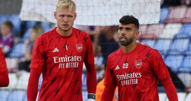 Mikel Arteta WILL follow through on his bold claim of substituting his goalkeeper late in games for tactical reasons, CHRIS SUTTON predicts on Mail Sport's 'It's All Kicking Off' after he dropped Aaron Ramsdale for David Raya