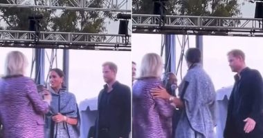 Moment Meghan Markle suffers a microphone mishap on stage at Kevin Costner's star-studded fundraiser