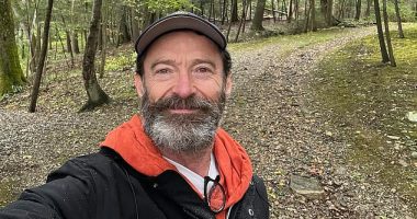 Hugh Jackman, 54, (pictured) looked to be in good spirits on Sunday as he took a walk through nature, a week after announcing his shock split from wife Deborra-Lee Furness