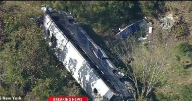 One dead and at least 46 injured after charter bus full of Farmingdale High School students going to band camp crashes off an embankment on I-84 in Orange County, New York